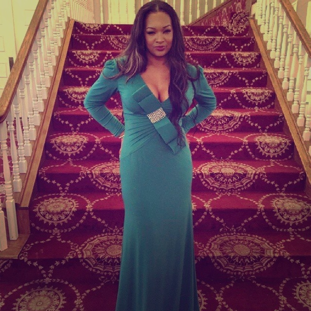 Jovani Emerald Green Gown   V shaped in the back.